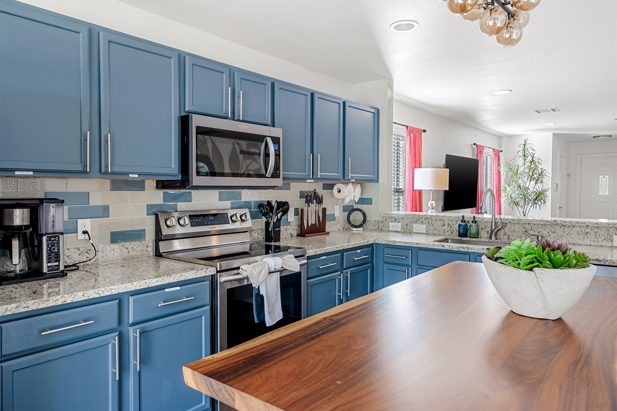 Gorgeous natural wood island and updated appliances