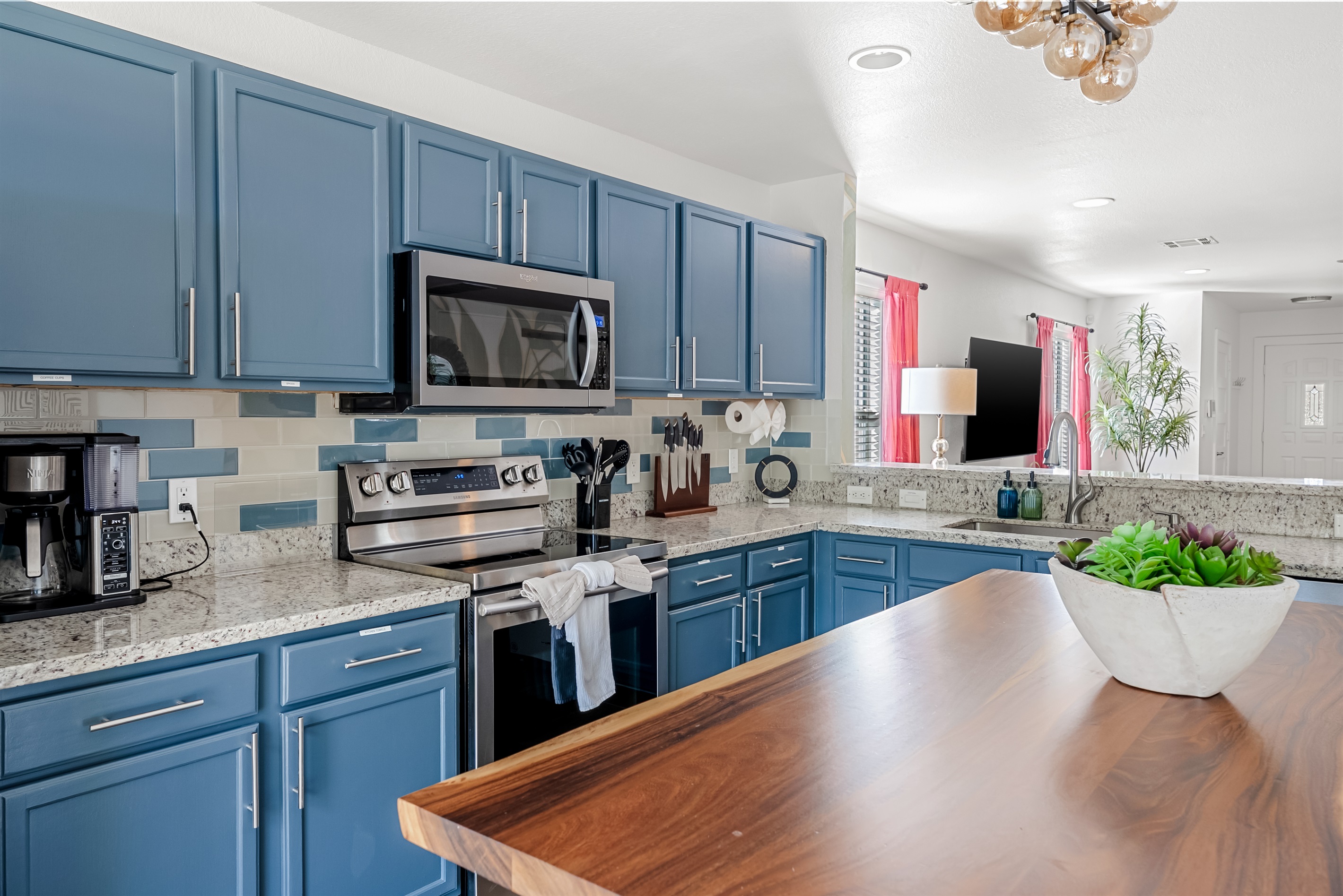 Gorgeous natural wood island and updated appliances