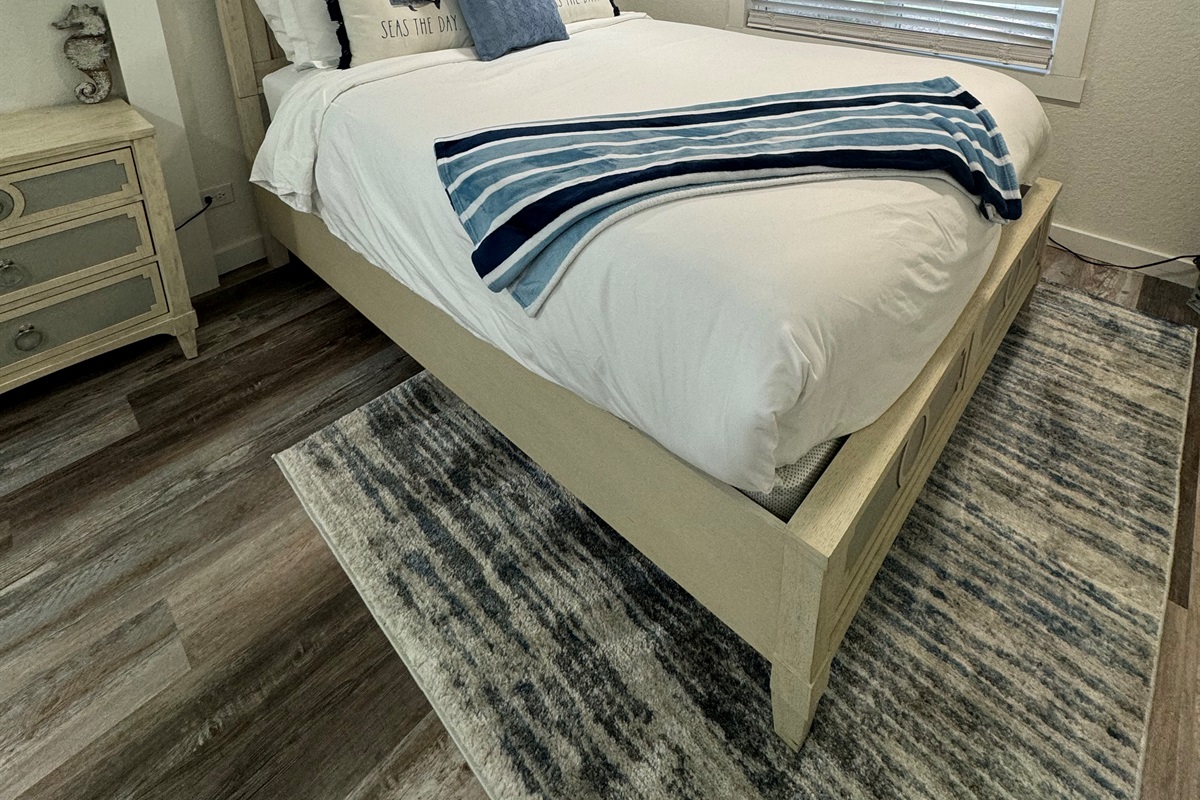 First bedroom with queen bed