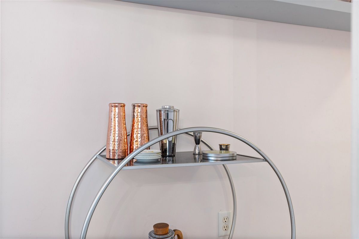 Bar cart with essentials for evening cocktails.