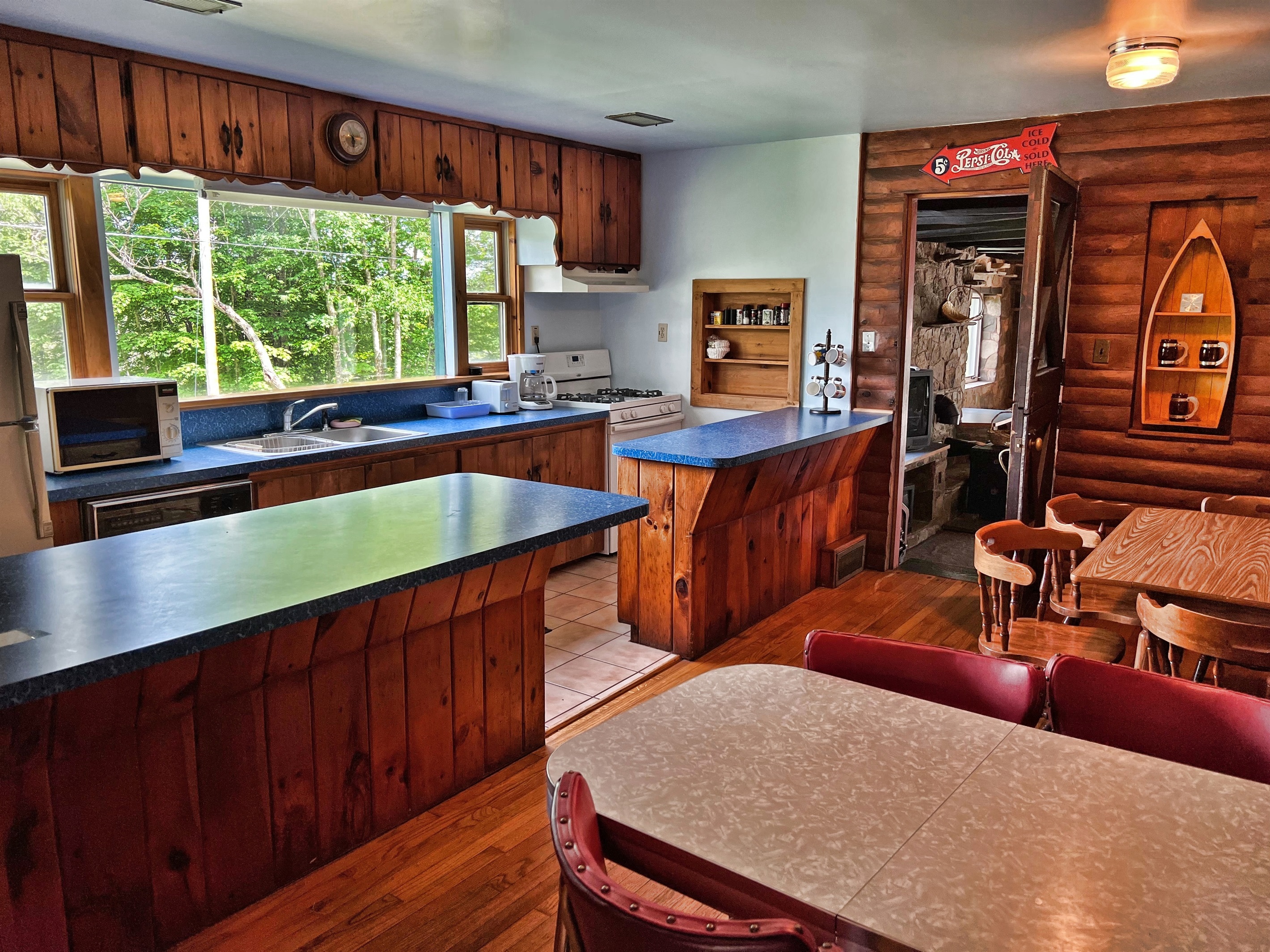 Kitchen area with lots of counter space to serve your group scrumptious food!