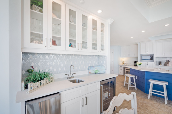 Wet bar with built in beverage fridge and ice maker!