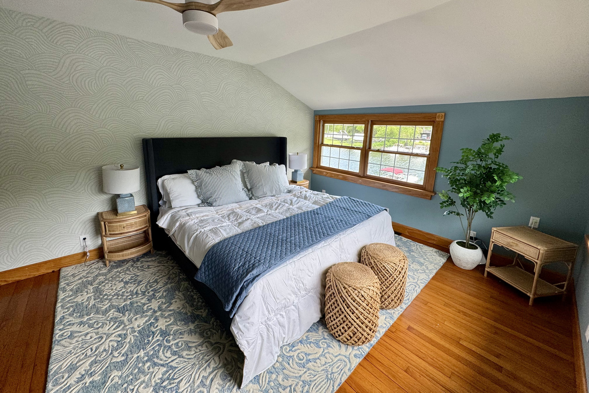 Spacious primary bedroom with king bed