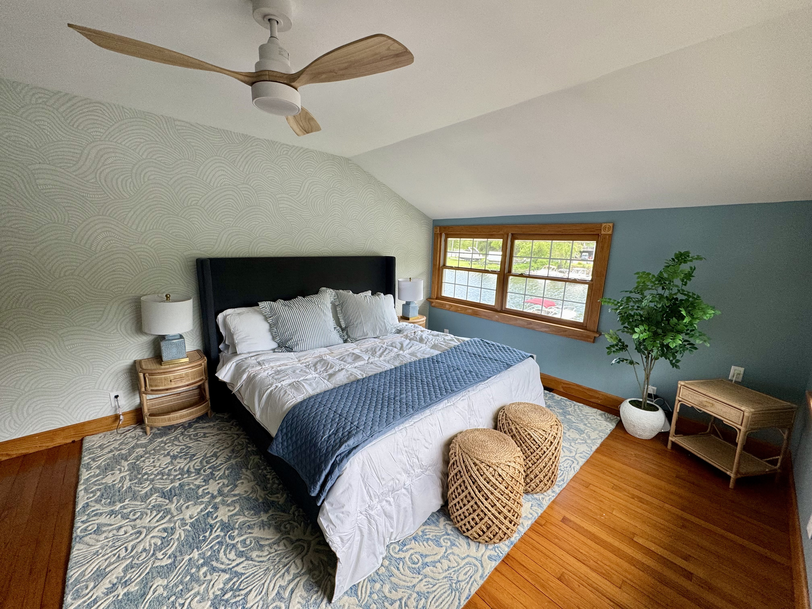 Spacious primary bedroom with king bed