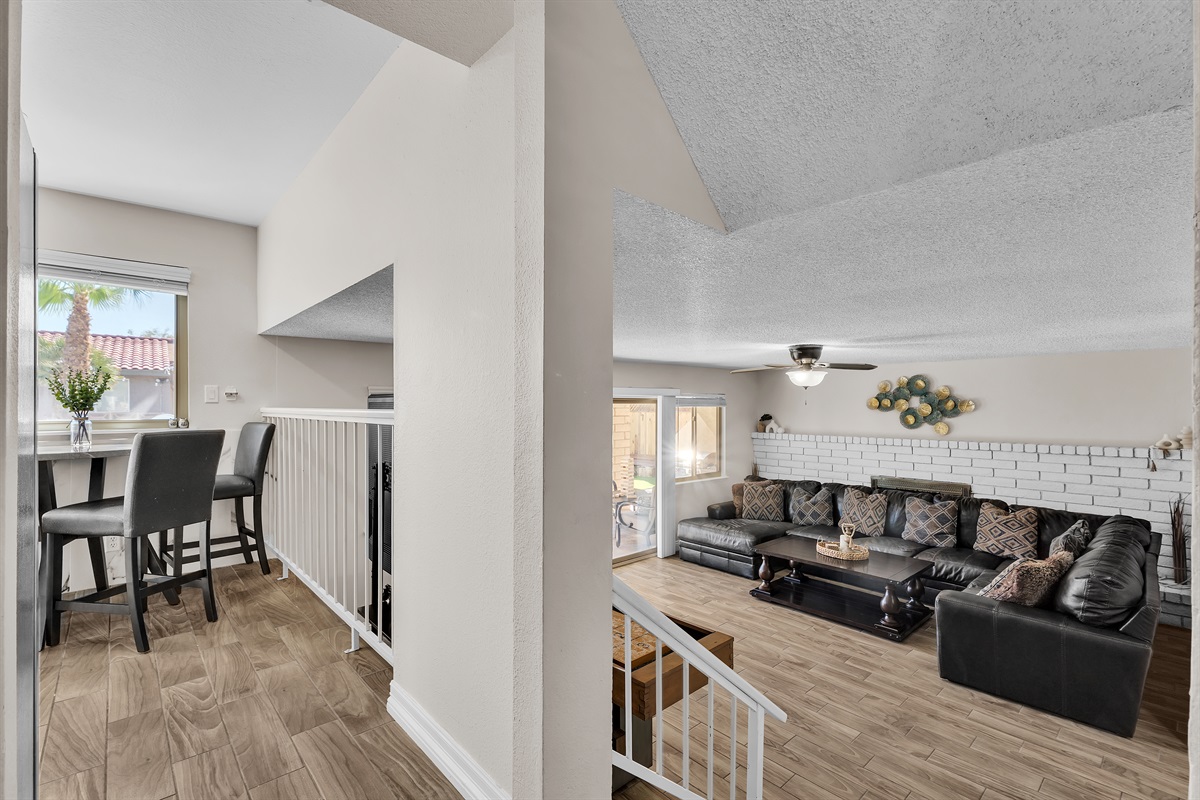 Living room 2 with 86 inch tv, shuffleboard, Nintendo switch, karaoke and bar sink