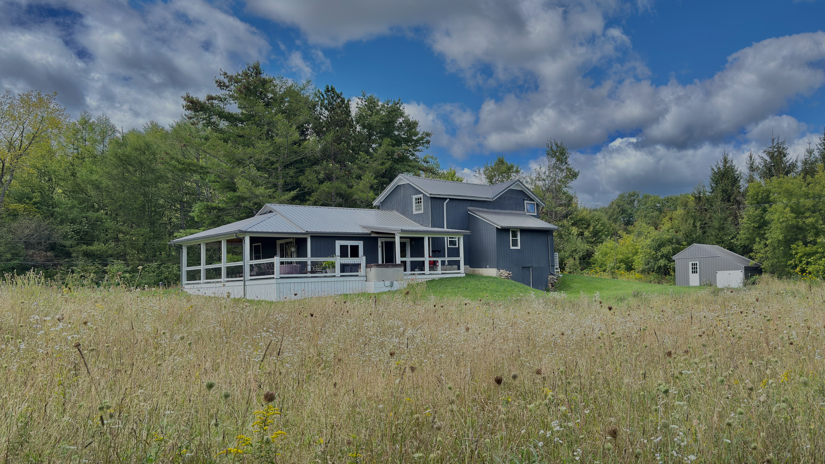Looking back at the house from the meadow path—a peaceful retreat nestled right in the heart of nature.