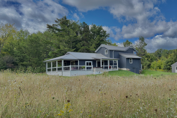 Looking back at the house from the meadow path—a peaceful retreat nestled right in the heart of nature.