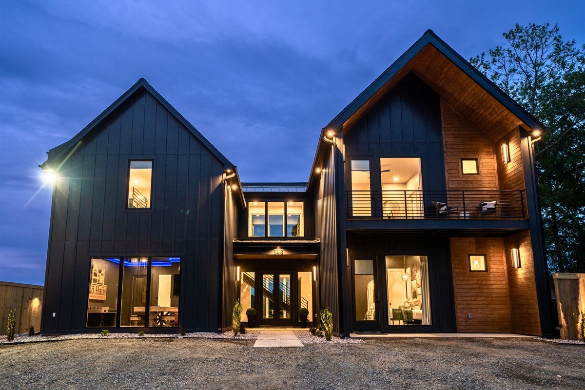 Experience the magic of twilight at our beautiful property, where the colors of the sky complement the modern design.