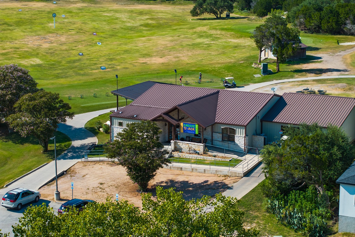 Caddie Shack is a family-friendly sports bar located at the Point Venture Golf Course. Enjoy the driving range, 9-hole course, and live music on weekends.