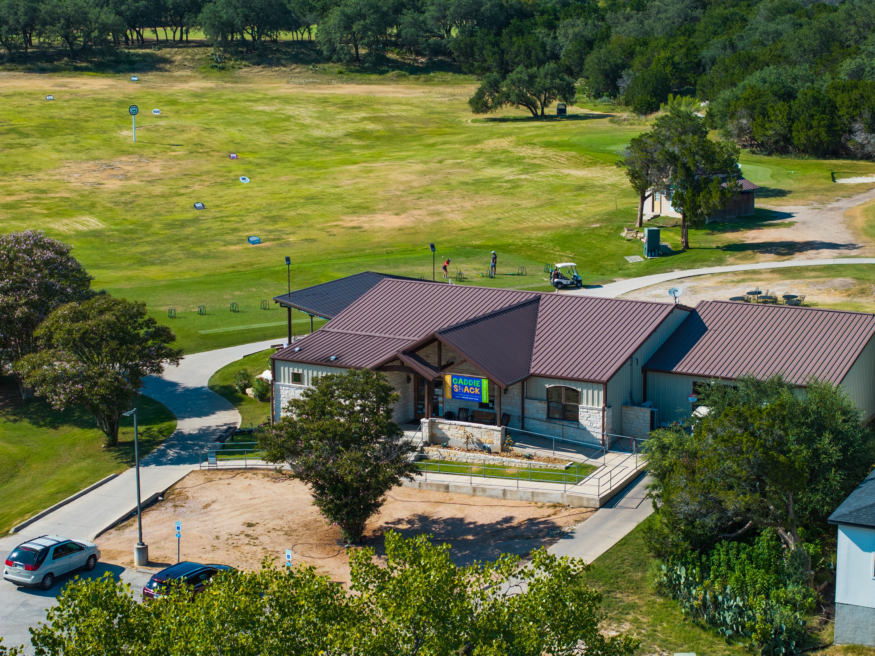 Caddie Shack is a family-friendly sports bar located at the Point Venture Golf Course. Enjoy the driving range, 9-hole course, and live music on weekends.