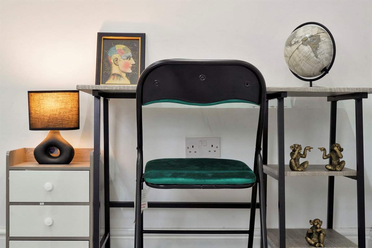 [dedicated workspace, plug sockets nearby, quiet corner]