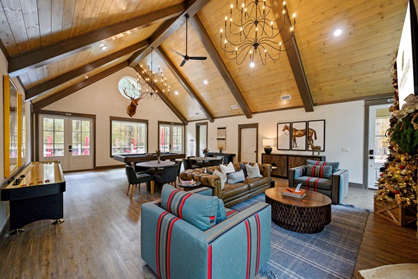 Your home base for fun and relaxation — unwind by the fire, challenge friends to a game, and enjoy this stunning lodge-style clubhouse