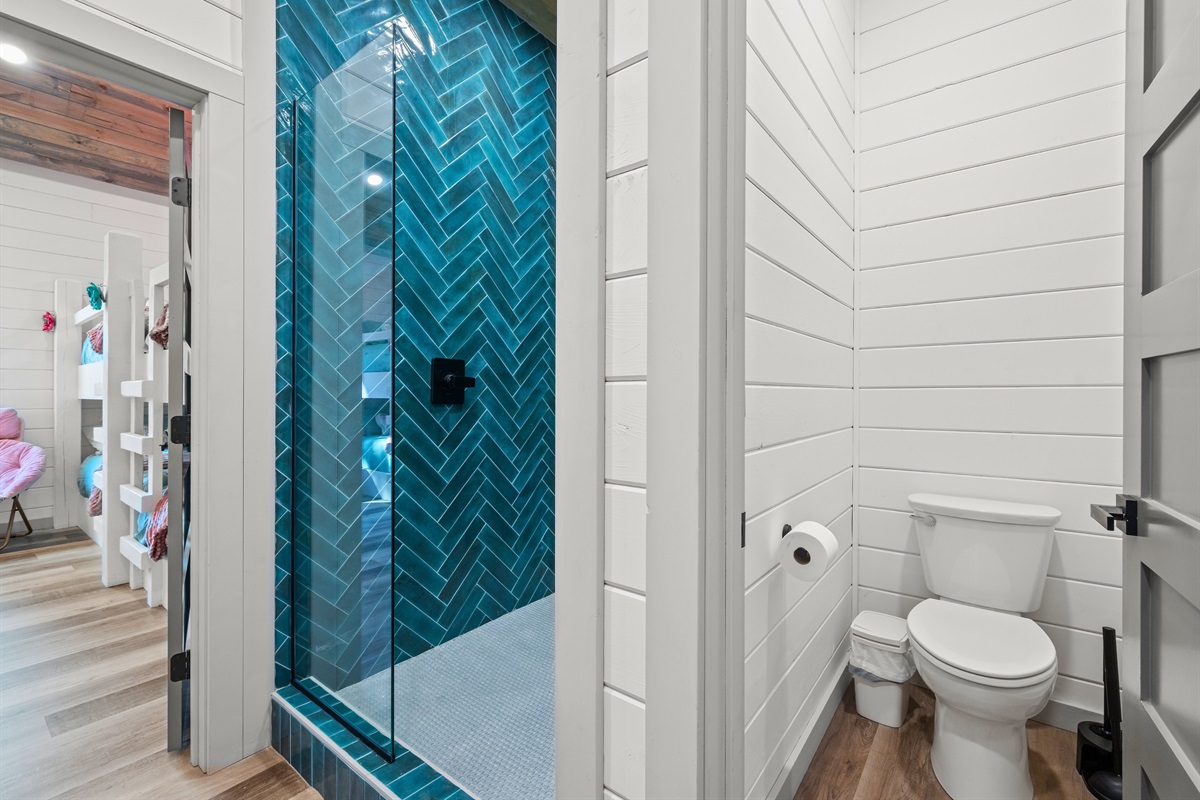 Each bathroom includes everything guests could need, with thoughtful design touches that make it feel like home.