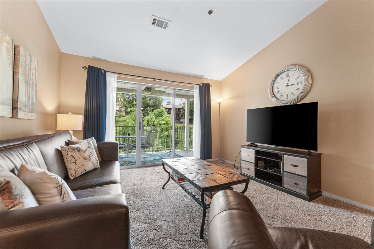 Stretch out for a movie night or a quiet evening in with soft light and easy deck access.