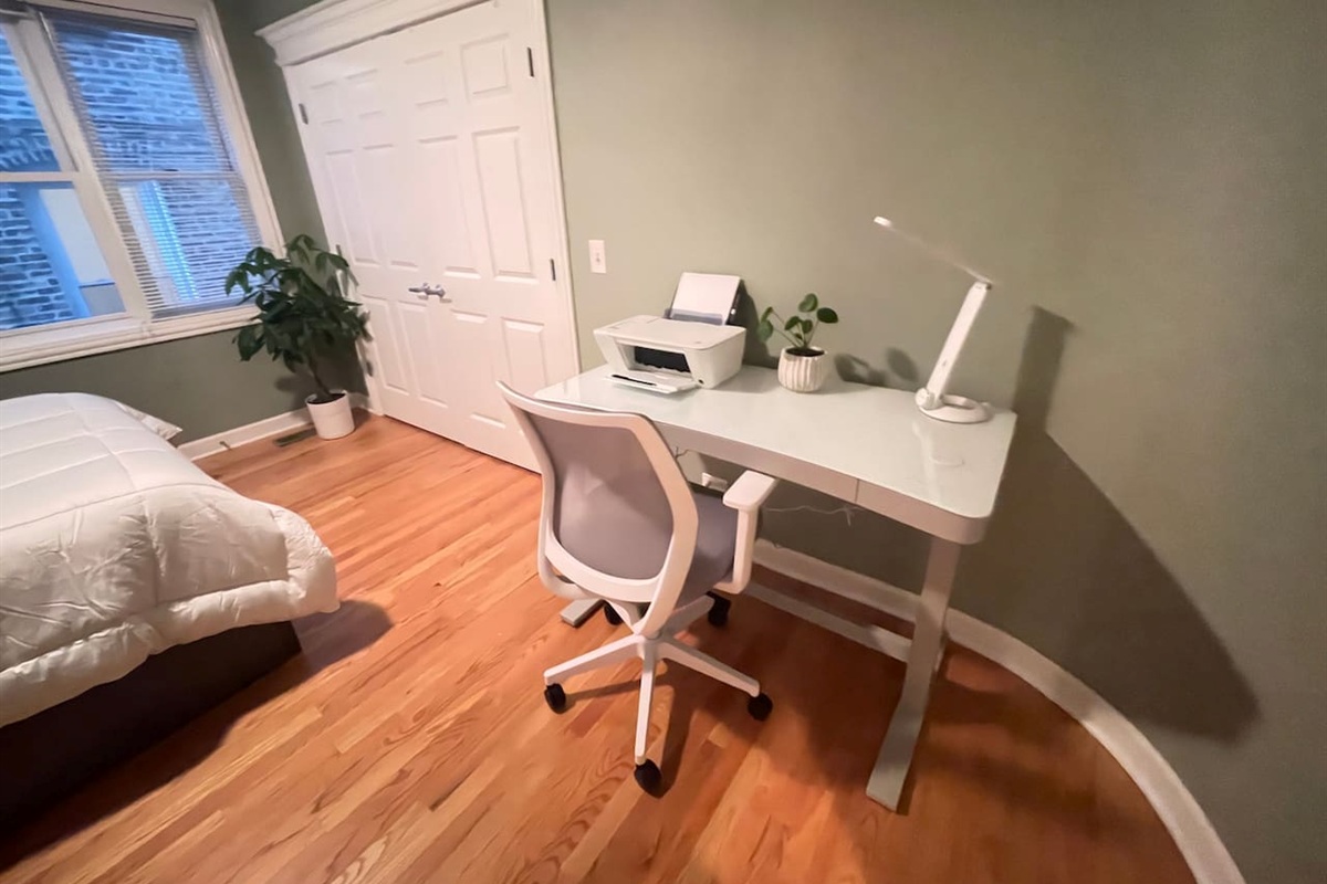 Bedroom with a desk area for remote work or trip planning