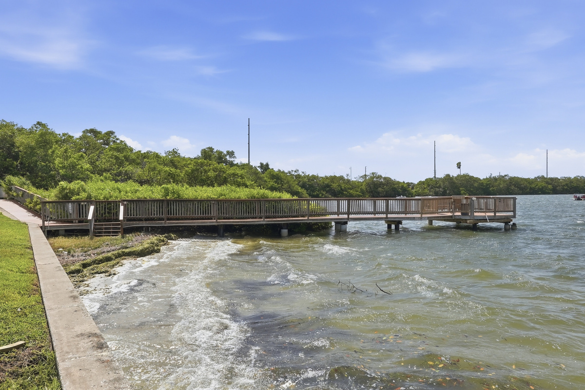Enjoy the peaceful waterfront surroundings at the community fishing pier, a relaxing spot to take in the views and experience the laid-back coastal atmosphere.