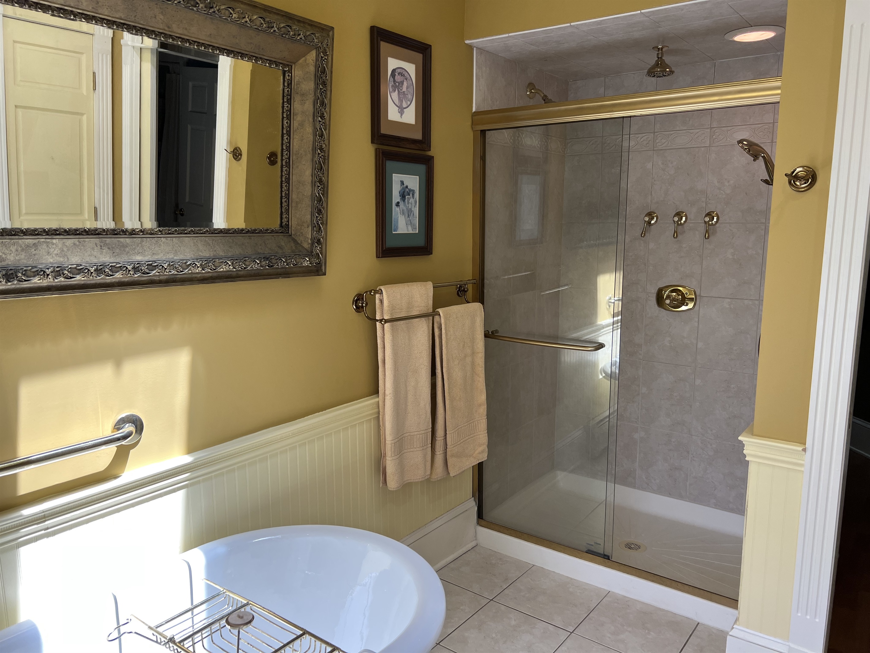 Clawfoot tub and glass shower