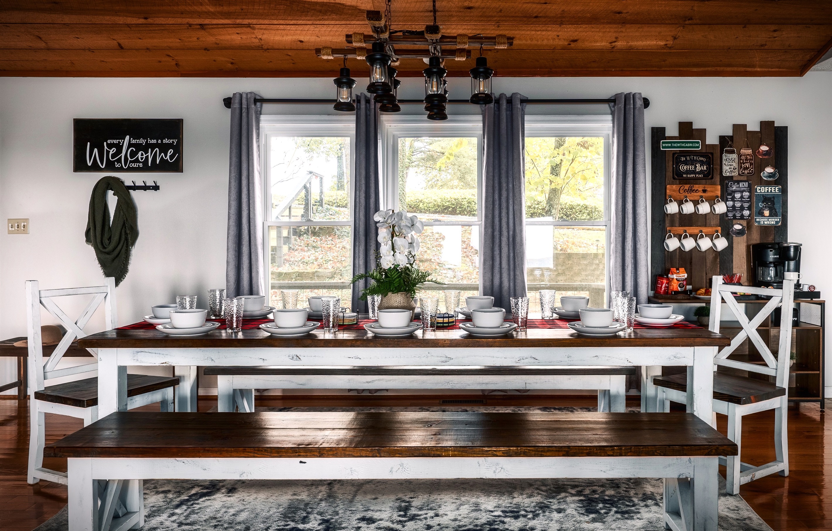 Our cabin offers a massive farm style dining table that truly sits 12 people so everyone can sit together.