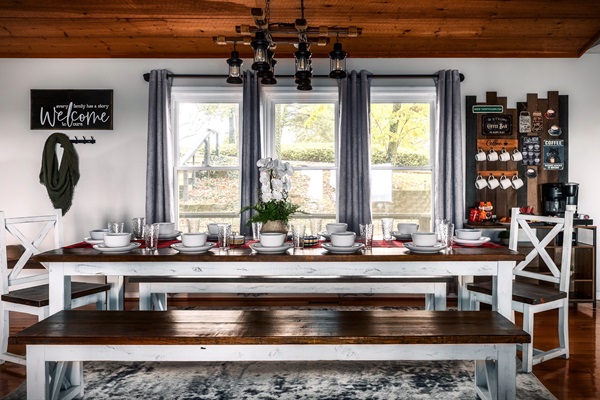 Our cabin offers a massive farm style dining table that truly sits 12 people so everyone can sit together.