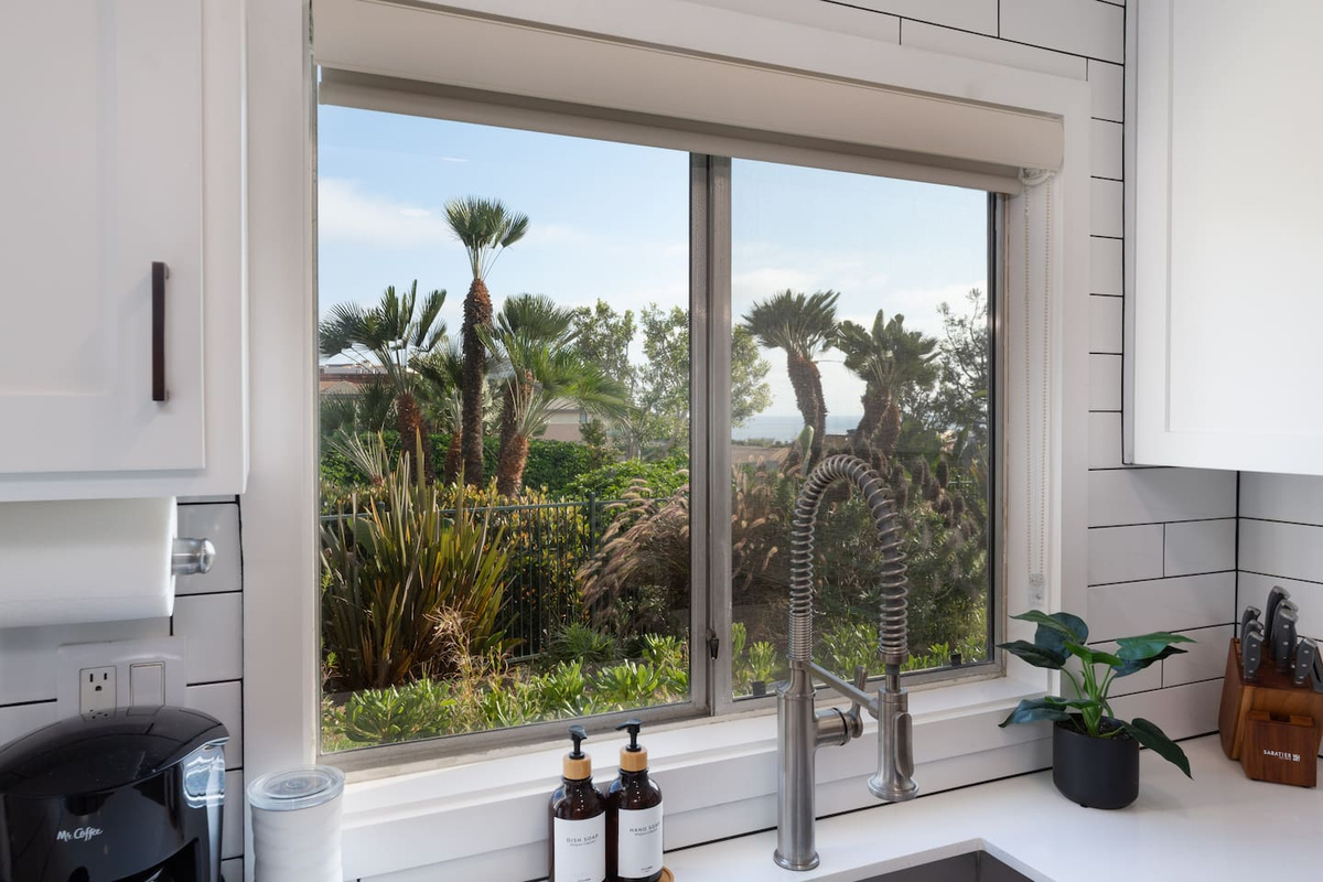Enjoy washing those dishes while you look outside and see that calming ocean 