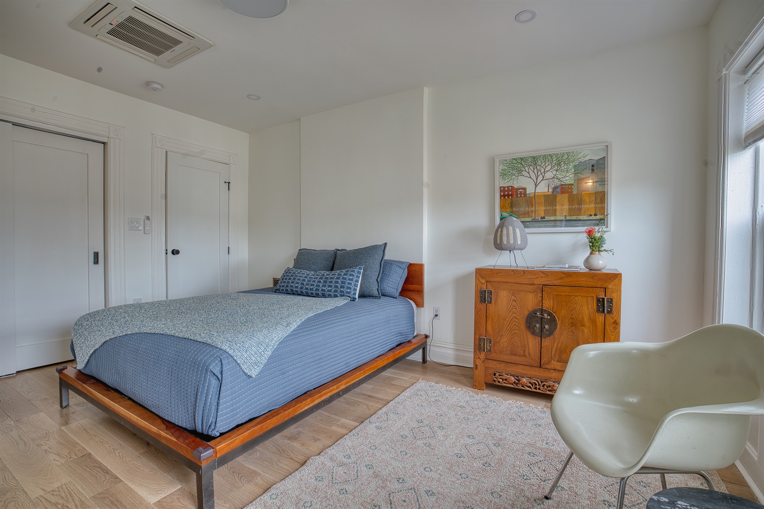 Queen sized bed on the upper floor of duplex complete with en-suite bathroom with heating floors for additional comfort. 