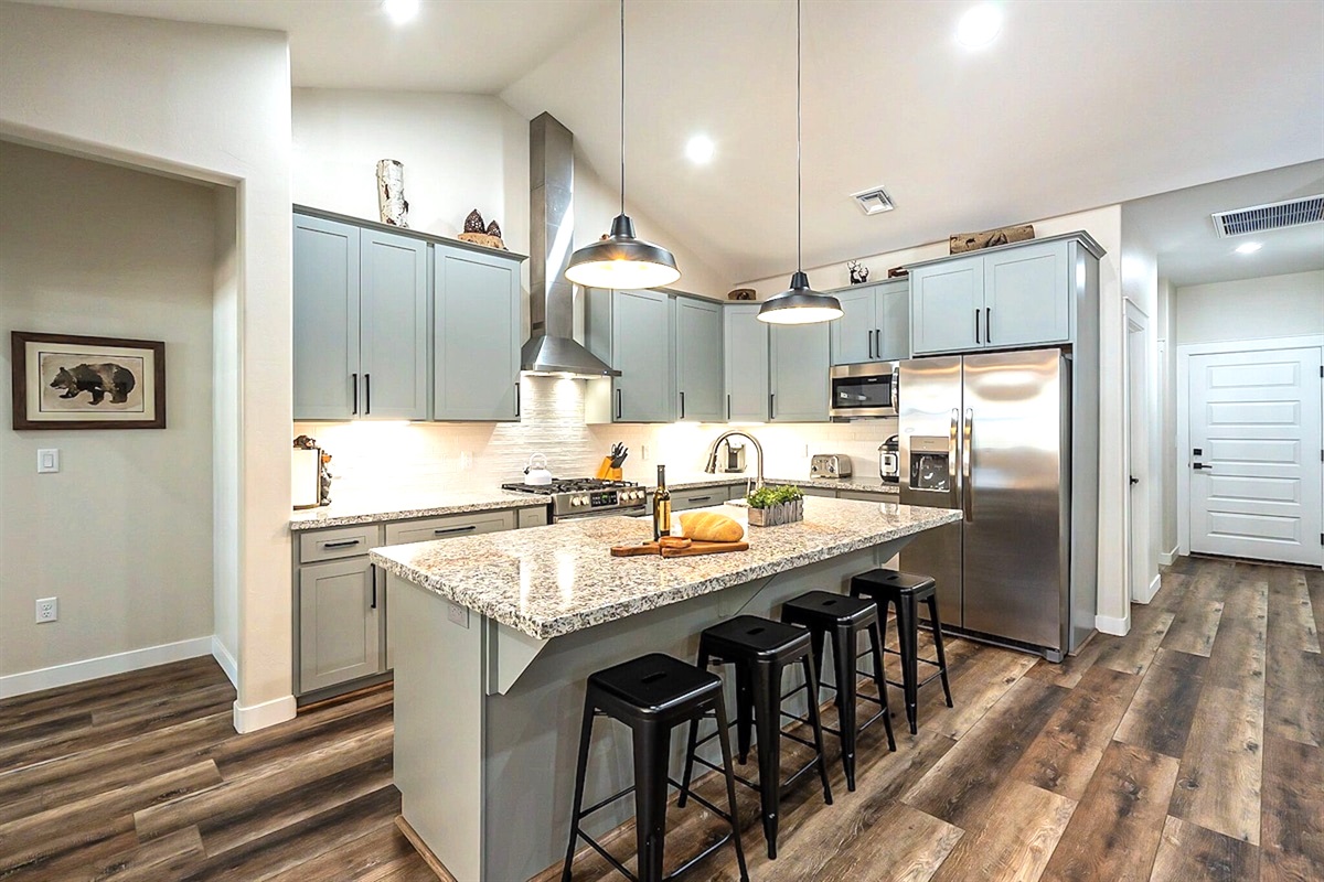 Kitchen island with seating for four plus plenty of space to prepare meals.