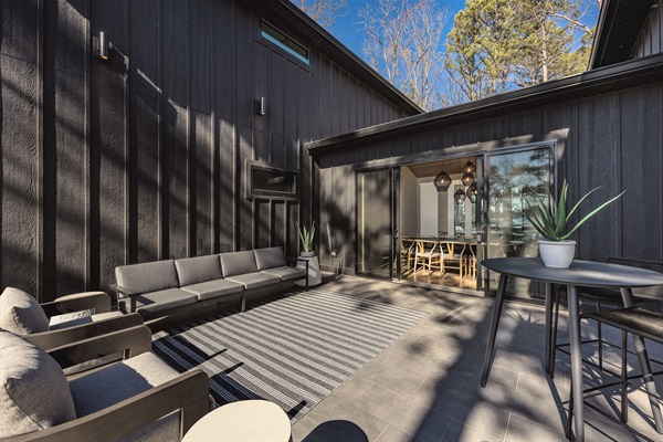 Step outside to this stylish courtyard patio—perfect for morning coffee, evening wine, or casual hangouts between adventures.
