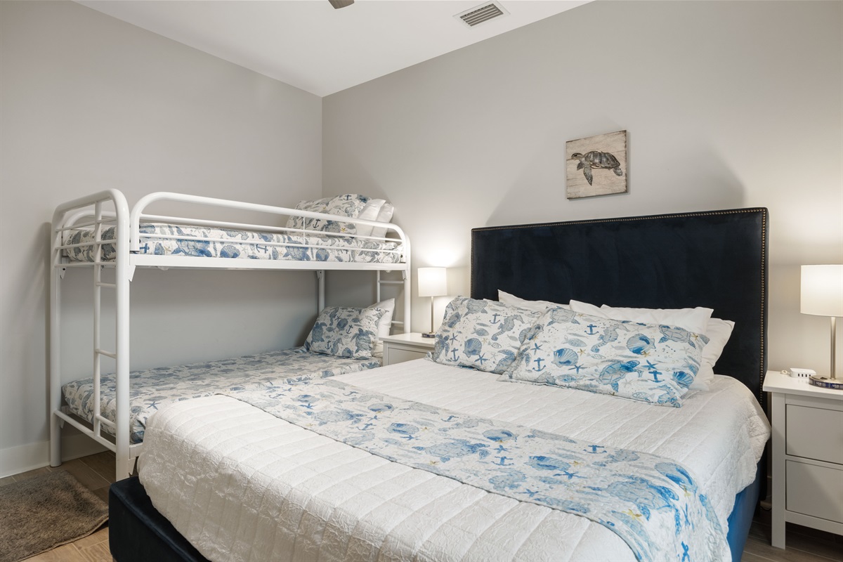 Queen bed in hall bedroom left side.