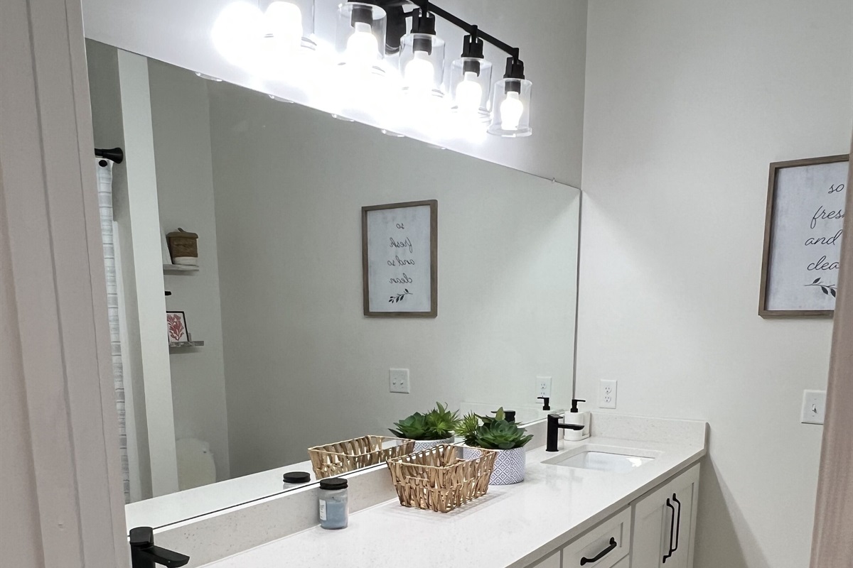 Both bathrooms are spacious with double sink countertops.