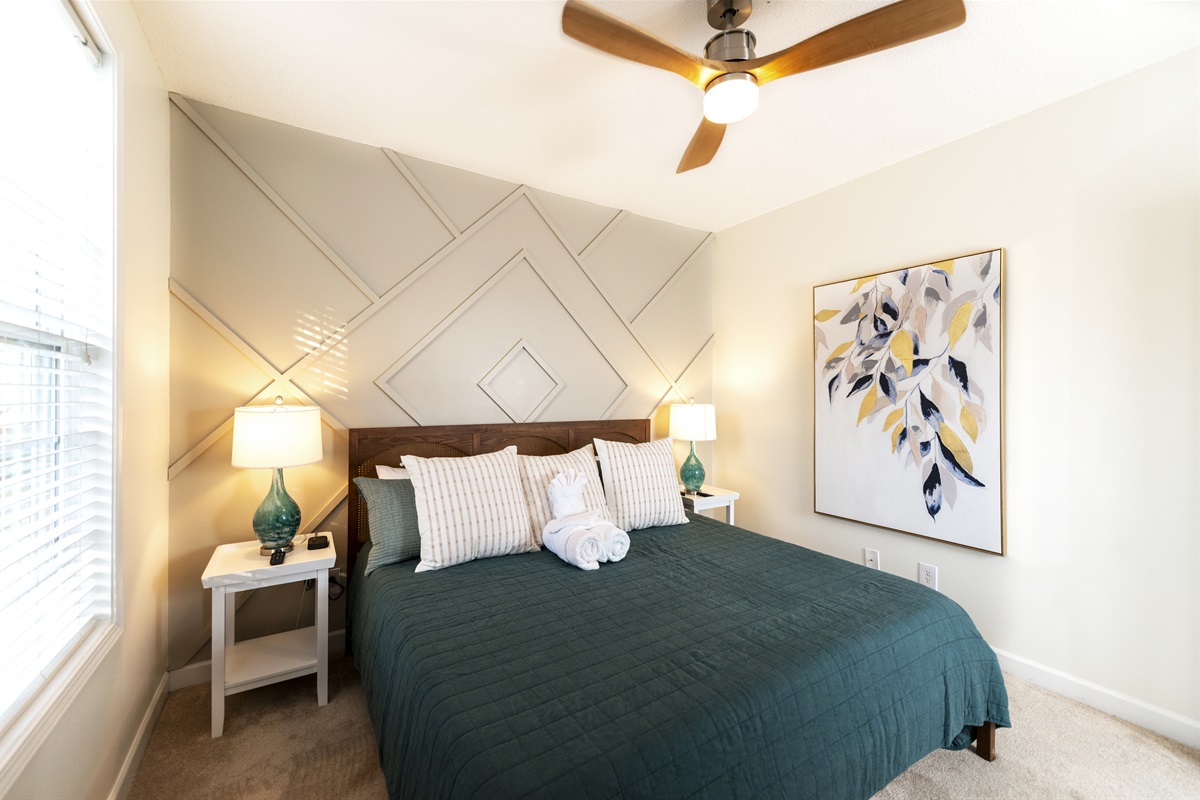 [Bedroom 1] Unwind in luxury with our king-size bed, the centerpiece of your cozy retreat. Experience ultimate comfort and restful nights, ensuring you wake up refreshed and ready to enjoy your each day of your stay. #beachbliss