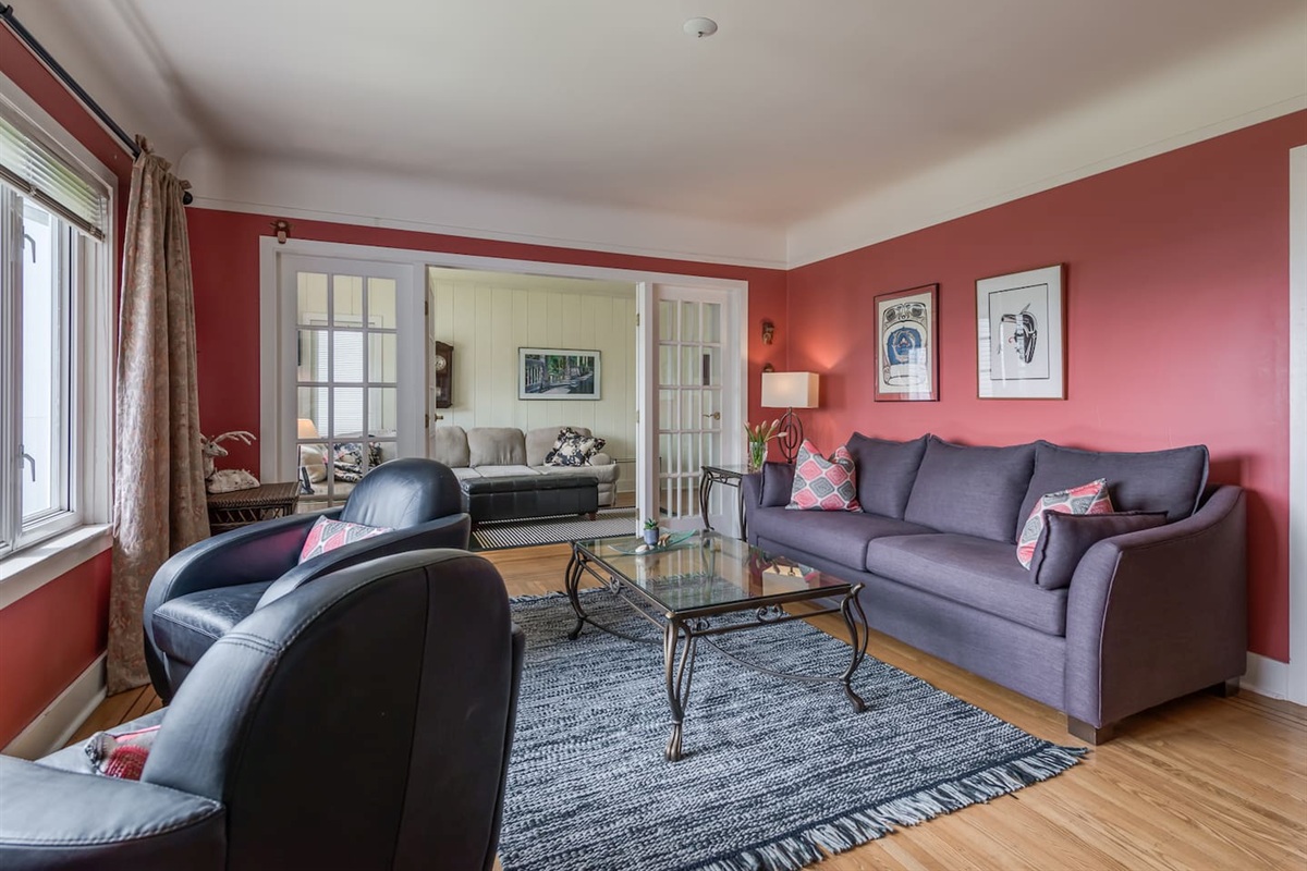 Next to the living room is the TV room.  A very comfy sectional along with a 70” television and home theatre system.