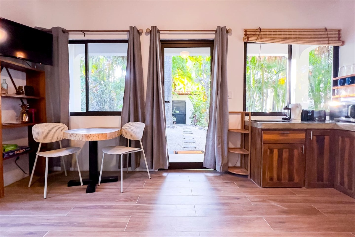 View from the sleeper sofa in the living room.  Light from the sunset streams into this space every evening casting beautiful light into the room. 