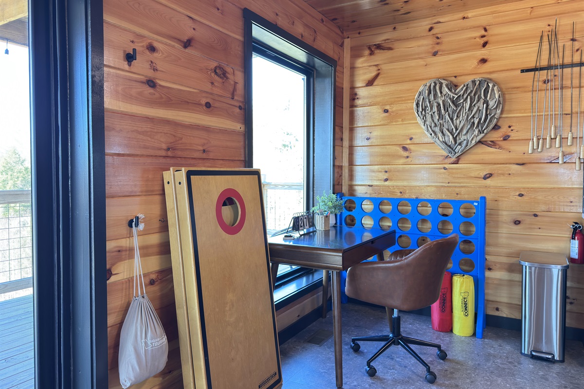 Desk area + cornhole & giant connect 4 games