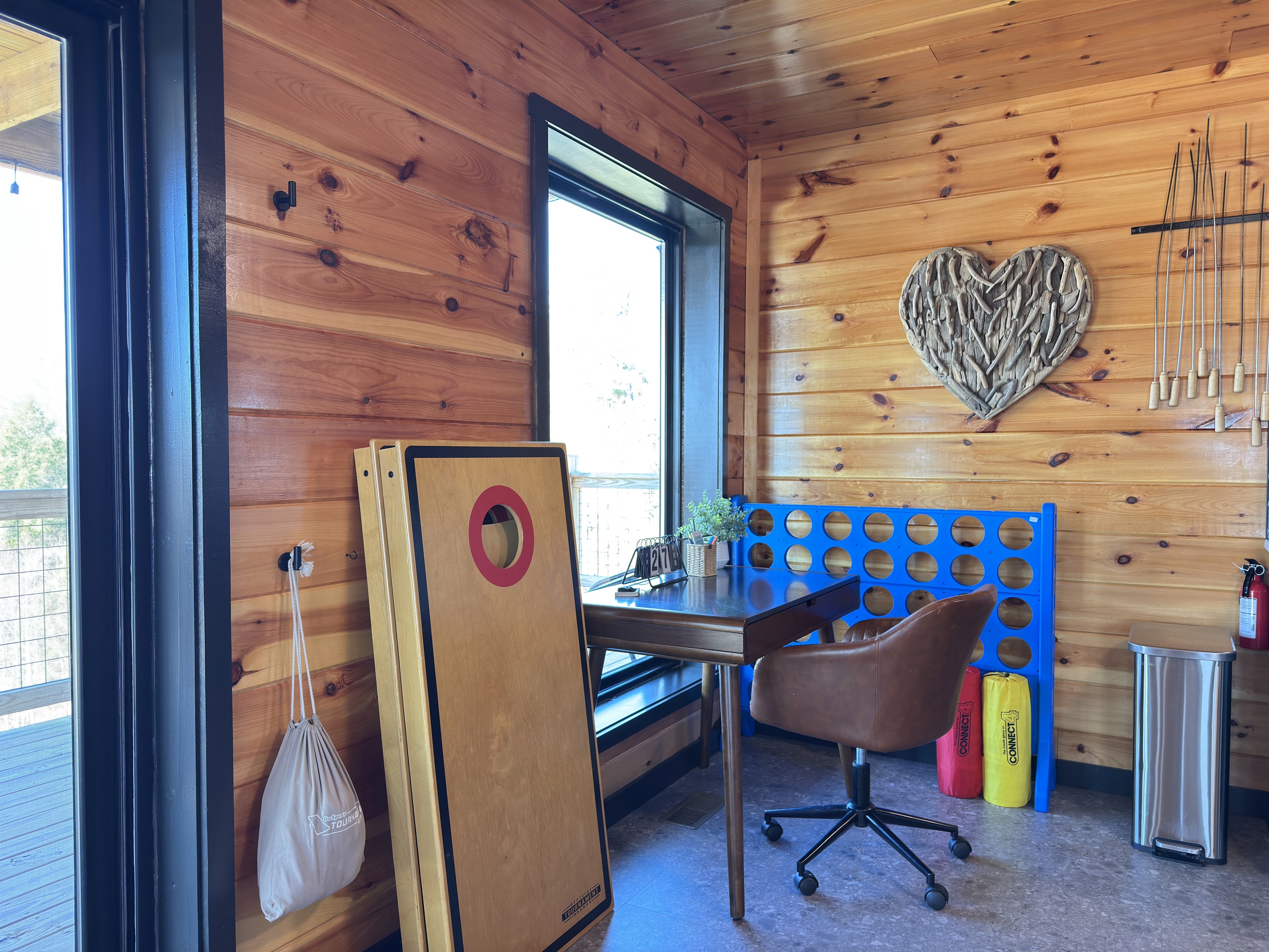 Desk area + cornhole & giant connect 4 games