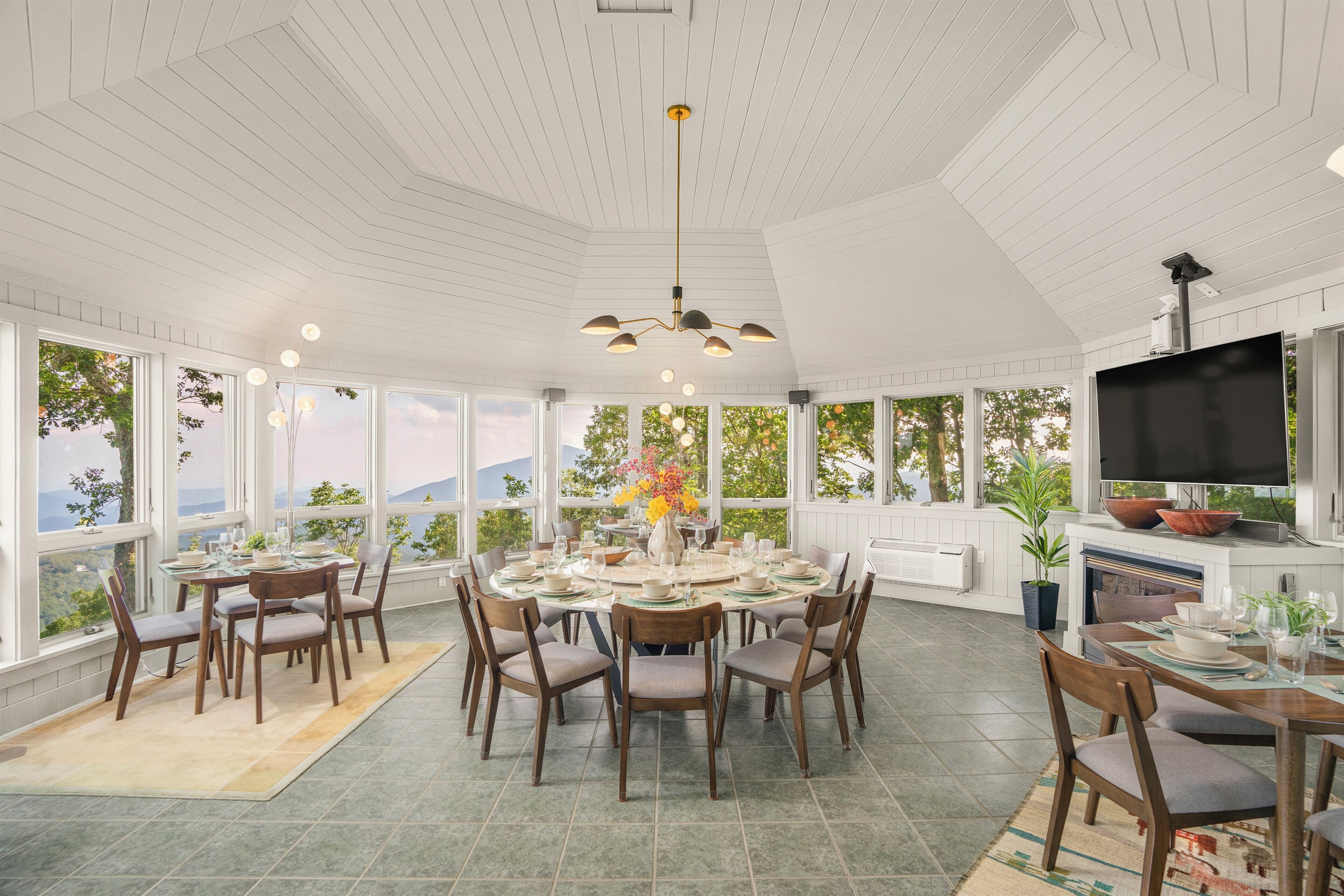 Dining room with seating for 20, glorious views, fireplace, and TV
