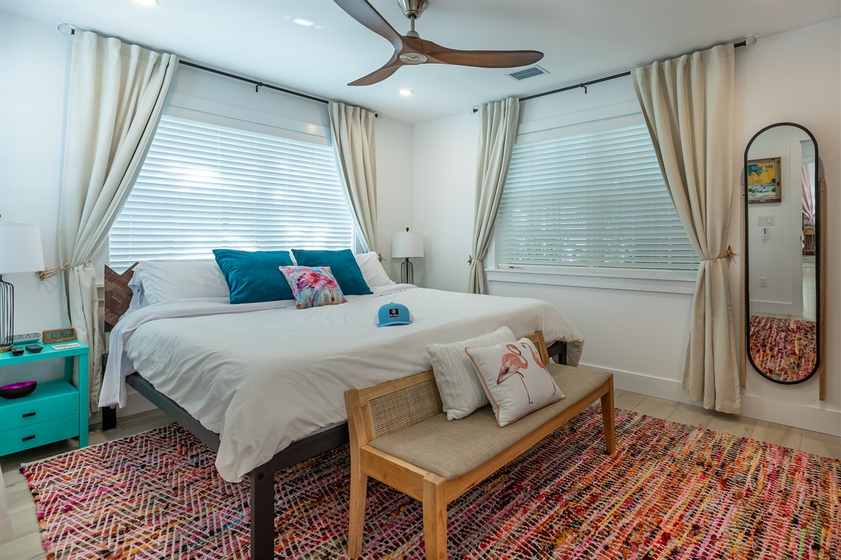 Bedroom Retreat: Bright and airy sanctuary with vibrant decor and serene ambiance!