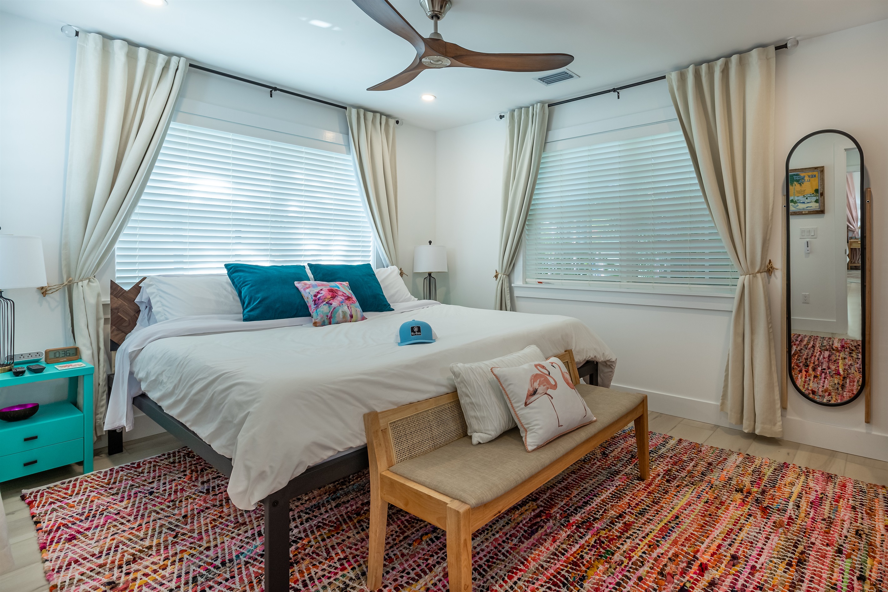 Bedroom Retreat: Bright and airy sanctuary with vibrant decor and serene ambiance!