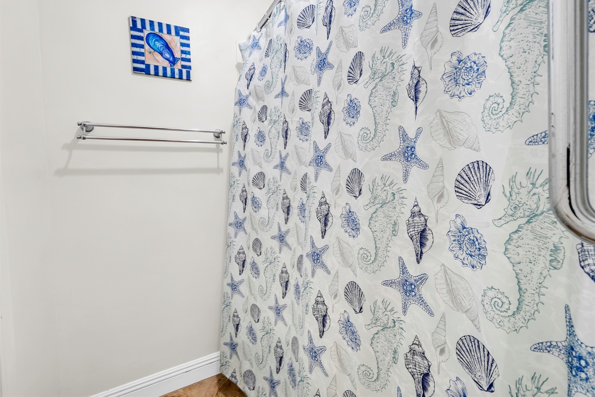 Shared shower between the two sink areas