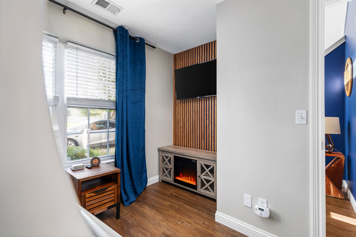 Cozy up to the electric fireplace in the 1st floor bunk room on those crisp fall South Bend nights