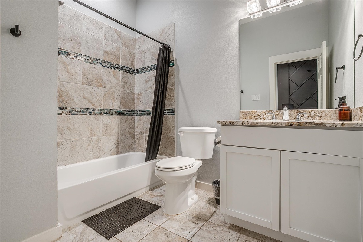 Second full bath with tub/shower combo—ideal for families.