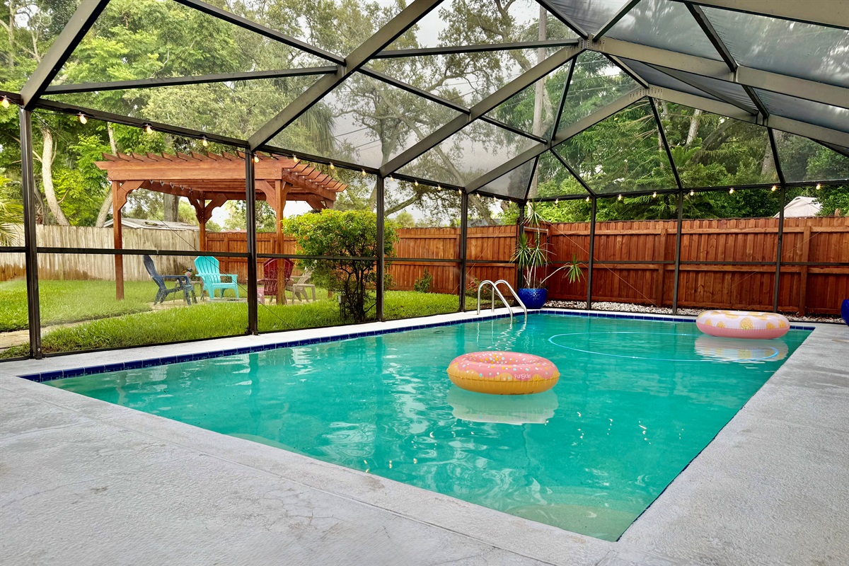 Enjoy tranquil dips in this sparkling screened pool, ideal for morning laps or quiet afternoon lounging.