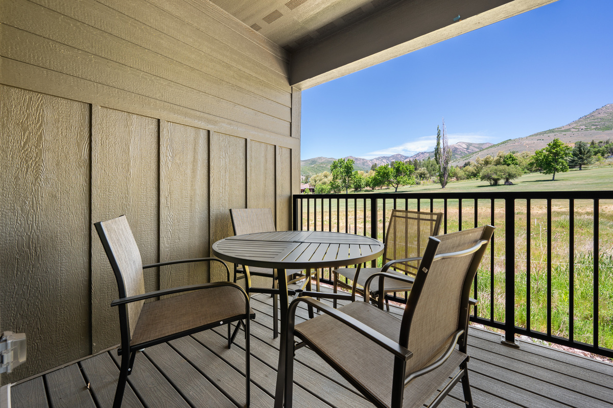 Enjoy outdoor dining while overlooking the rolling fairways below.