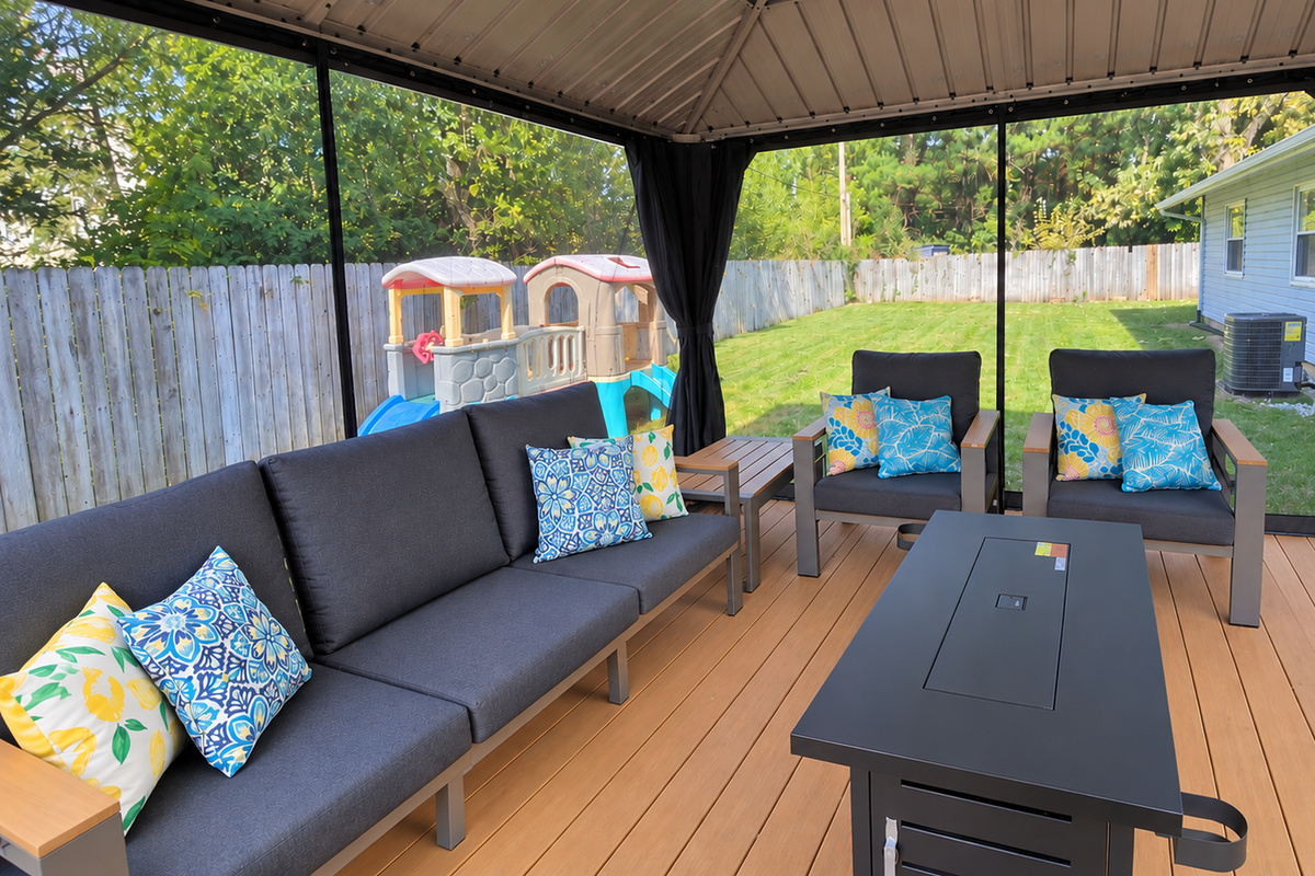 Relax outdoors with zippered bug screens, comfortable seating, and backyard views.