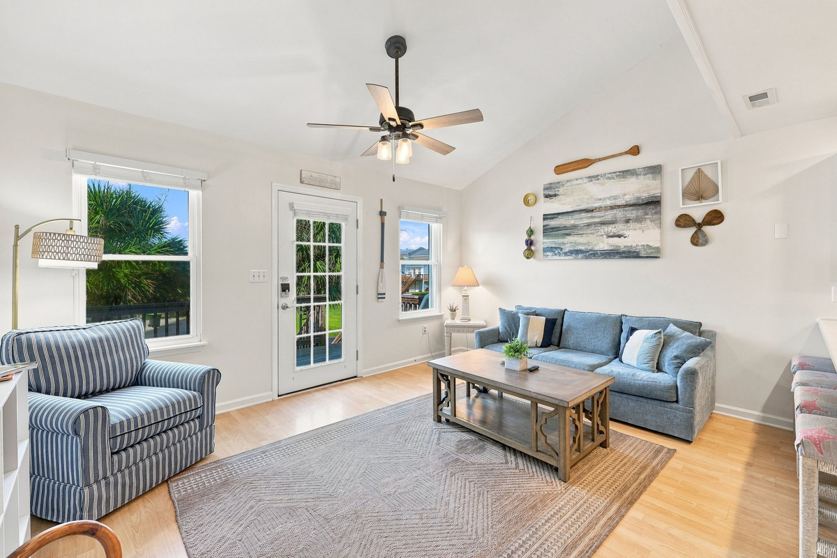 A cozy, sun-filled gathering spot designed for comfort, conversation, and making coastal memories.