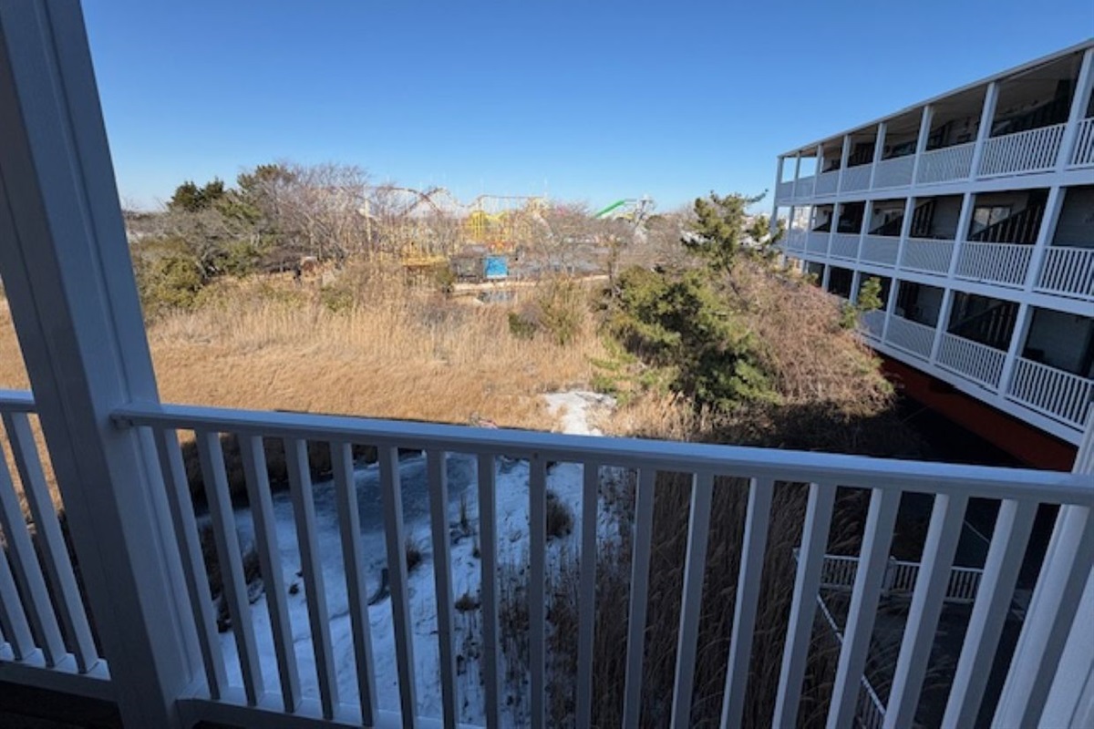 View of water and amusement park, in quiet neighborhood