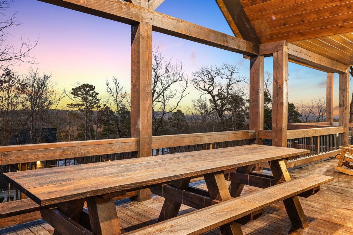Covered outdoor dining area perfect for meals with scenic sunset views