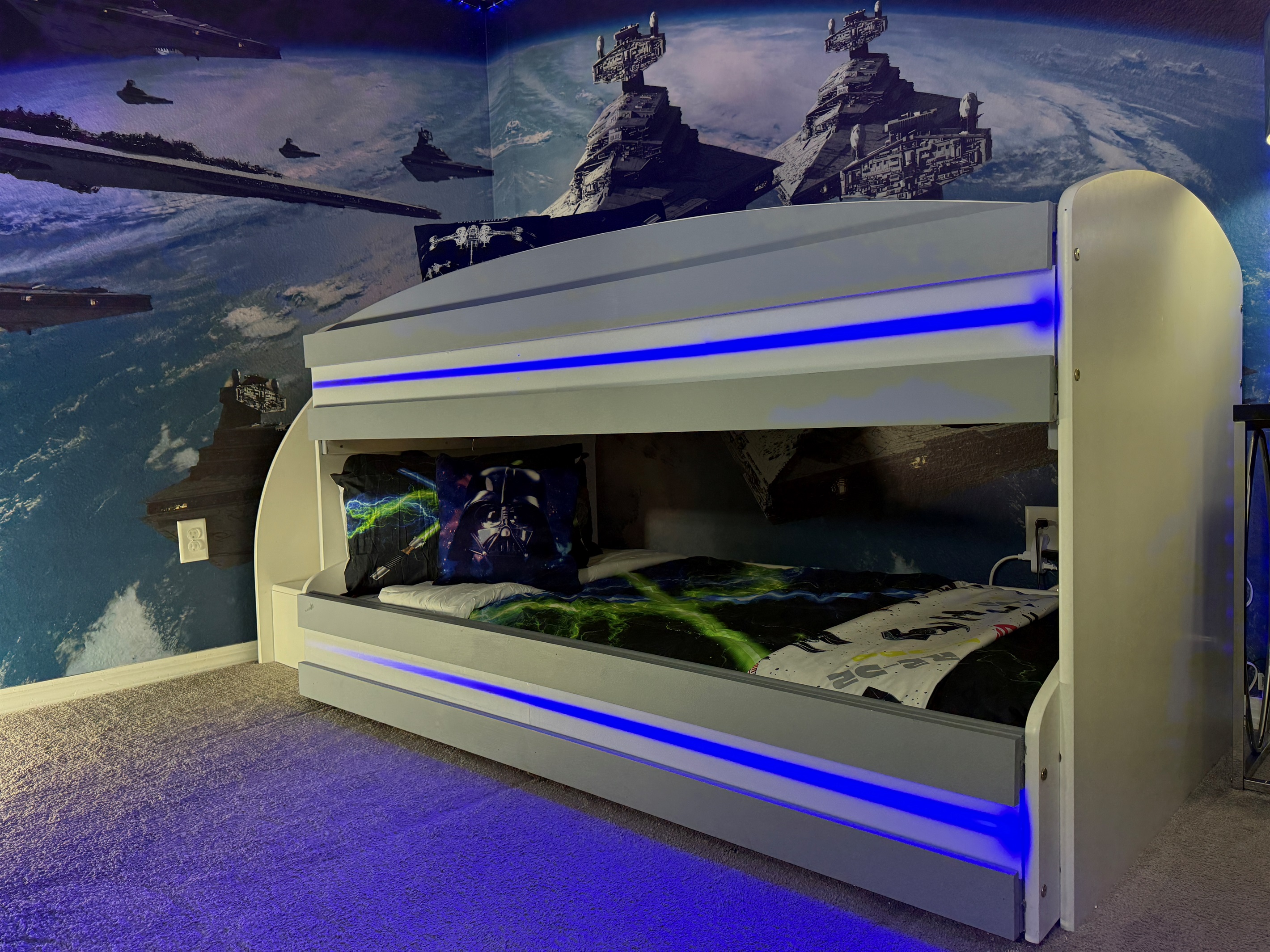 🌌 A galaxy of fun awaits! Our Star Wars bunk room has LED lights, Xbox, retro games, and safe, kid-friendly bunk beds.