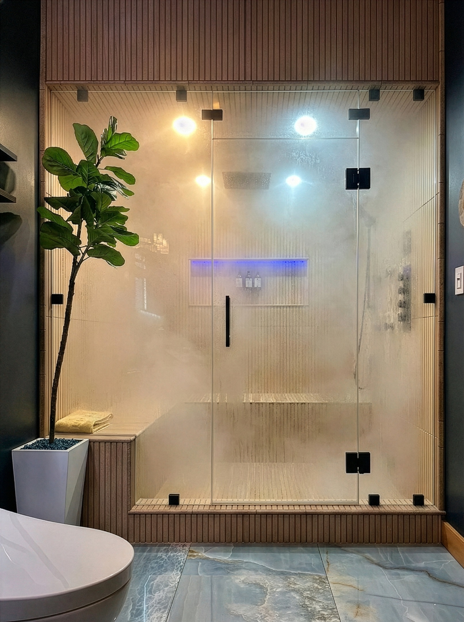 Large steamroom with aromatherapy, audio and light therapy