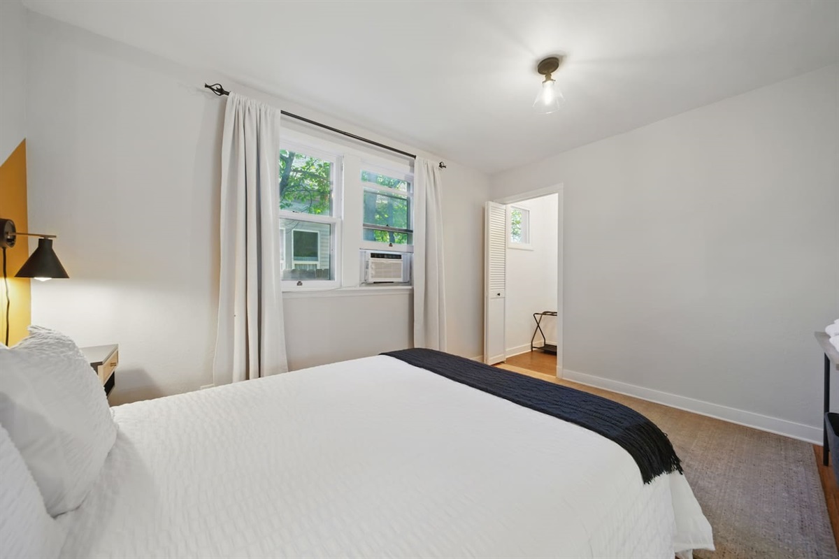 Queen bedroom #2, with window AC unit & walk in closet. 