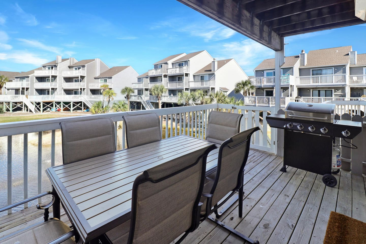 Fire up the gas grill, pull a chair to the deck table, and let dinner happen at the pace the Gulf sets.